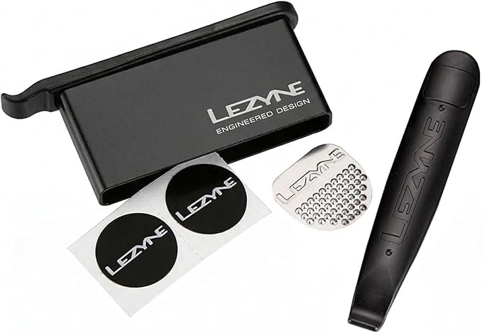 LEZYNE Bicycle Tire Lever Kit | Compact Durable Anodized Aluminum Integrated Patch Kit & Tire Lever Combo | Tire Boot, 6 Gluessless Patches & Stainless Steel Scuffer Included, Black