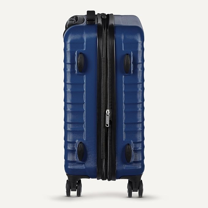 Amazon Basics 30" Hardside Large Checked Luggage with Multi-directional Wheels, Expandable for Up to 15% More Space, Scratch-Resistant Hardshell, Navy Blue