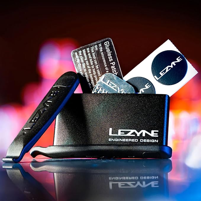 LEZYNE Bicycle Tire Lever Kit | Compact Durable Anodized Aluminum Integrated Patch Kit & Tire Lever Combo | Tire Boot, 6 Gluessless Patches & Stainless Steel Scuffer Included, Black