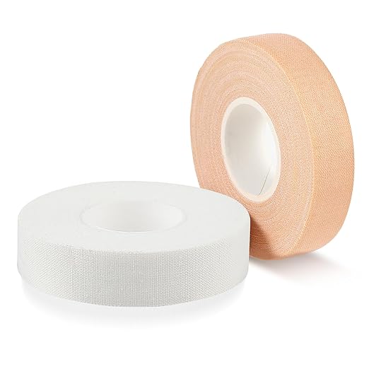 COMNICO Finger Tape, White Extra Strong 0.6-Inch x 32-feet Athletic Tape for Fingers Feet Sweat Volleyball Finger Tape for Outdoor Sports Climbing Football (White Skin Color, 2 Pcs)