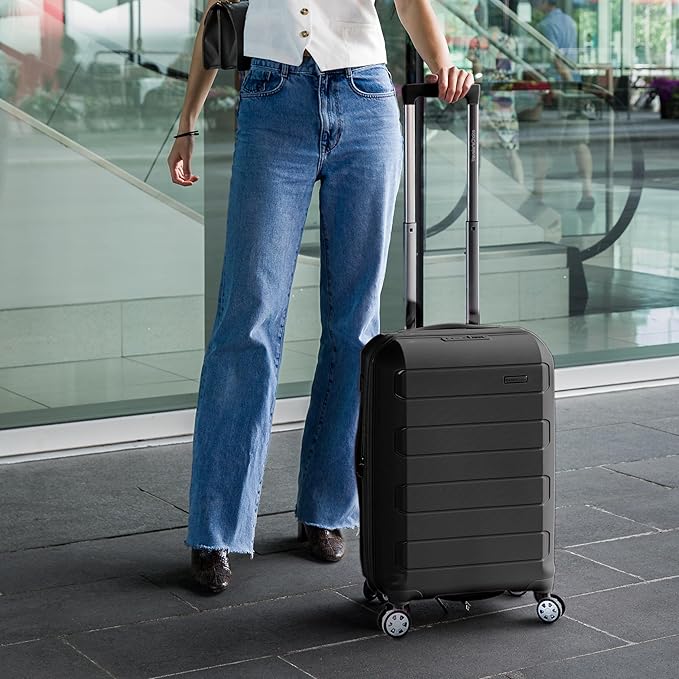 Traveler's Choice パゴサ ハードシェル 拡張可能荷物 スピナーホイール付き, ブラック, 22インチ機内持ち込み