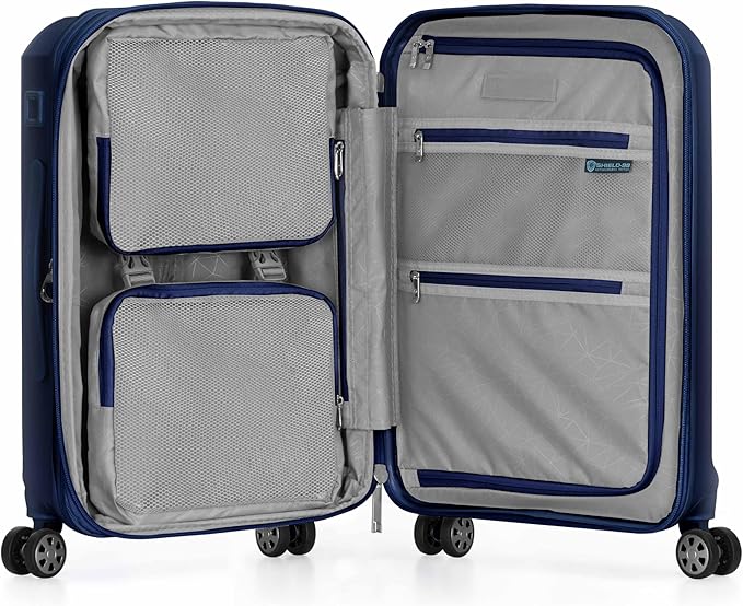 Traveler's Choice Pagosa ハードシェル拡張可能荷物 スピナーホイール付き、ネイビー、22インチ機内持ち込み