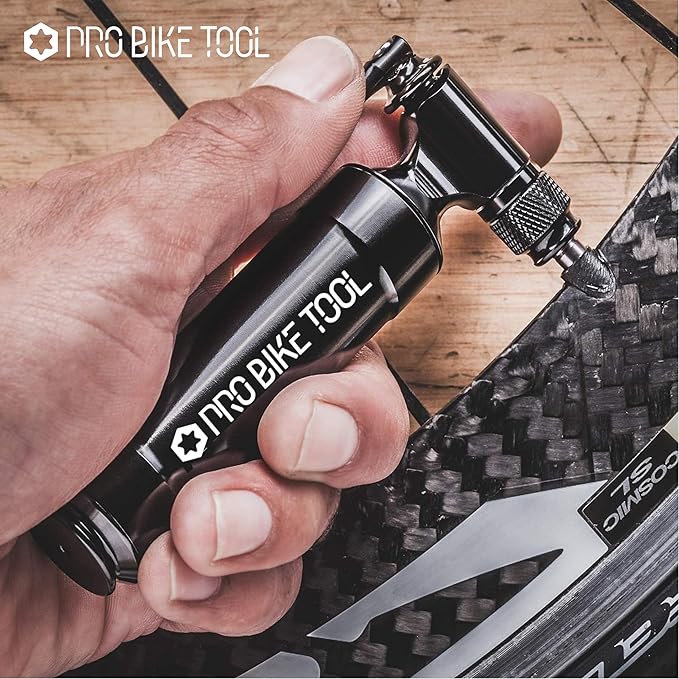 Pro Bike Tool CO2 Inflator with Cartridge Storage Canister Quick, Easy and Safe - for Presta and Schrader - Bicycle Tire Pump for Road and Mountain Bikes