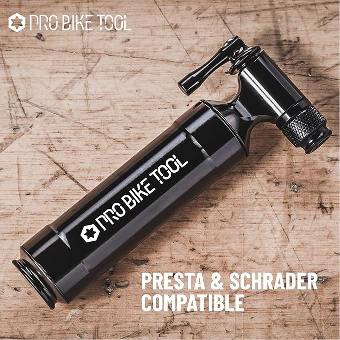 Pro Bike Tool CO2 Inflator with Cartridge Storage Canister Quick, Easy and Safe - for Presta and Schrader - Bicycle Tire Pump for Road and Mountain Bikes
